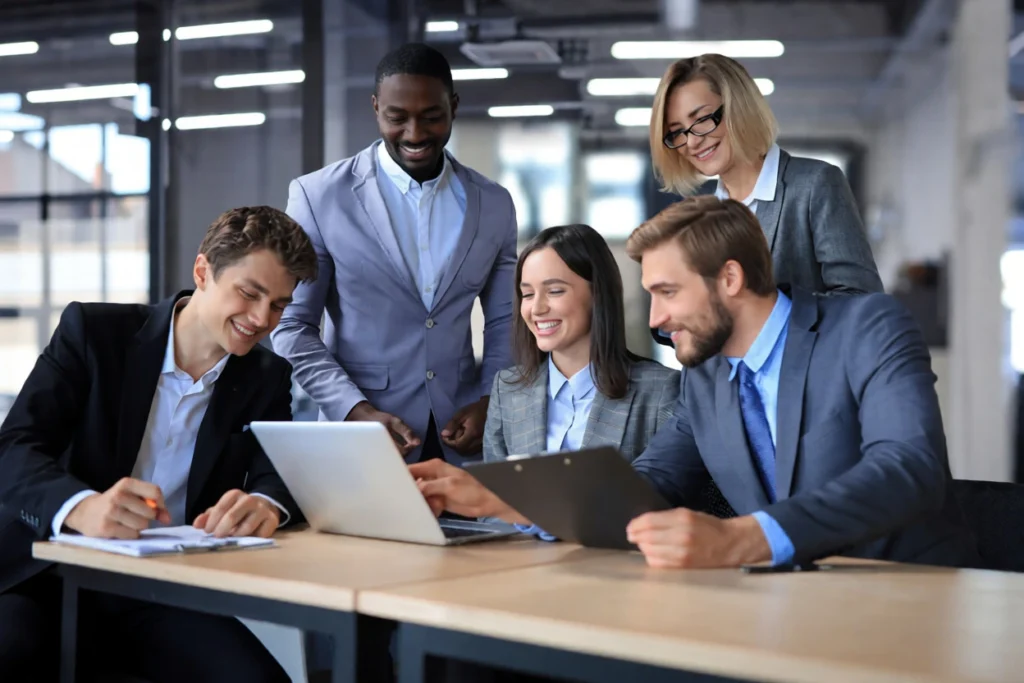 A business team reviewing strategies, representing when a company should invest in professional business consulting services