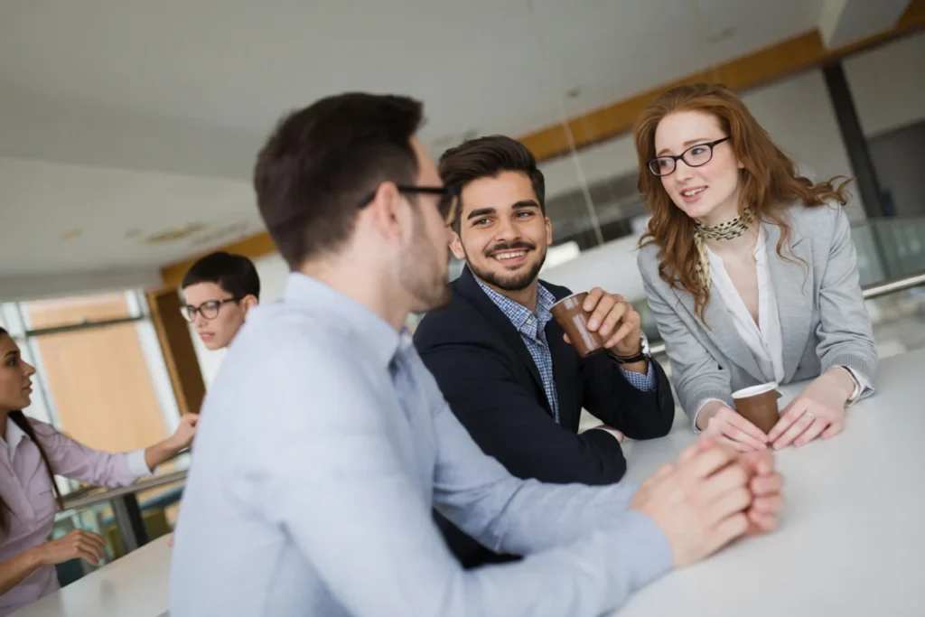 Business executives discussing strategies with a trusted business consultant in Denver