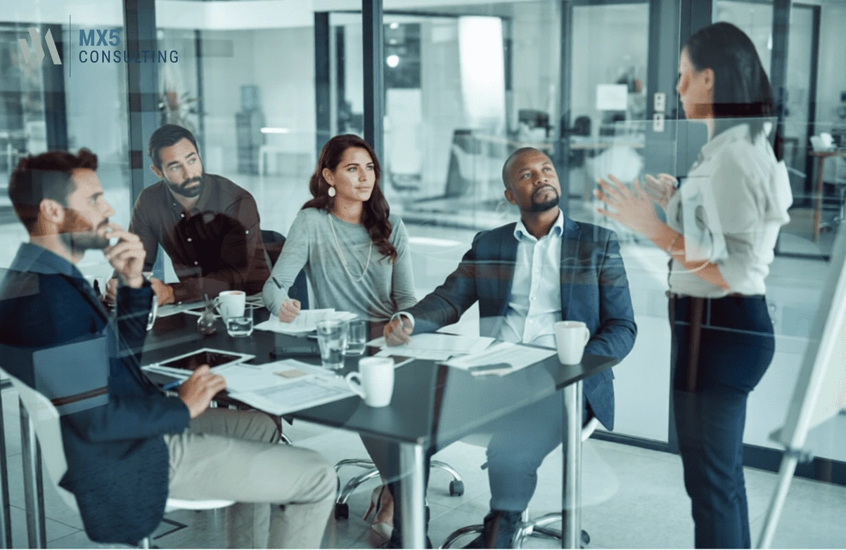 Executive Business Coaching companies guiding a CEO in a strategy session